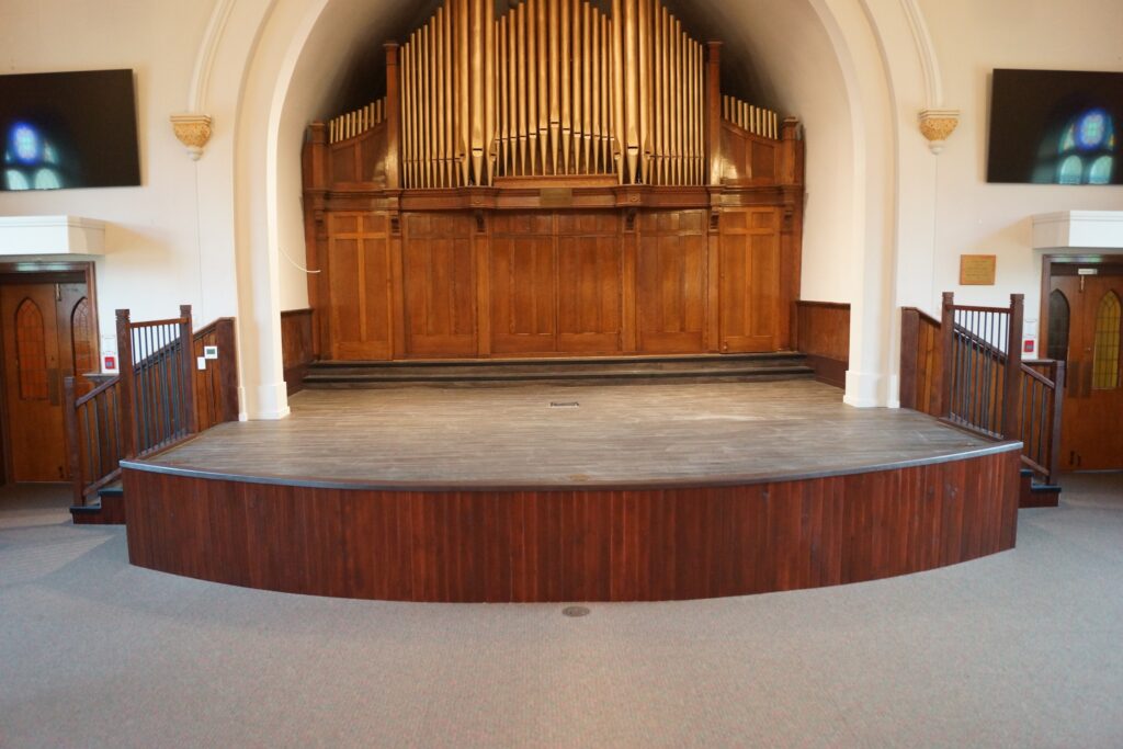 Our Stained Glass Centre for the Performing Arts empty stage ready for your event.